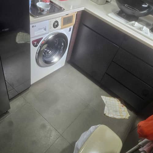 觀塘甄先生的洗衣困擾：這部LG WFT系列洗衣機顯示 dE，師傅現場更換門鎖掣恢復運作 🧩