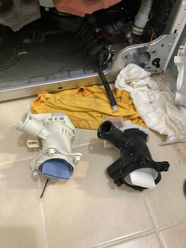 排水泵換新卻突遇倒灌：這部西門子WD系列洗衣機E18故障的意外轉折 🌀