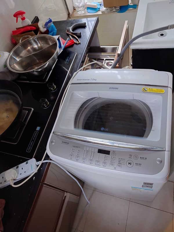 從廚房狹縫搬出到現場拆解，這部 LG WT系列洗衣機不排水的真相 🧐
