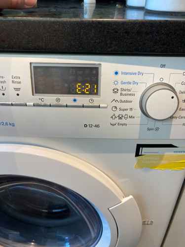 許先生的25分鐘靜音修復：這部西門子WD系列洗衣機E21故障快速恢復運作 ⏱️