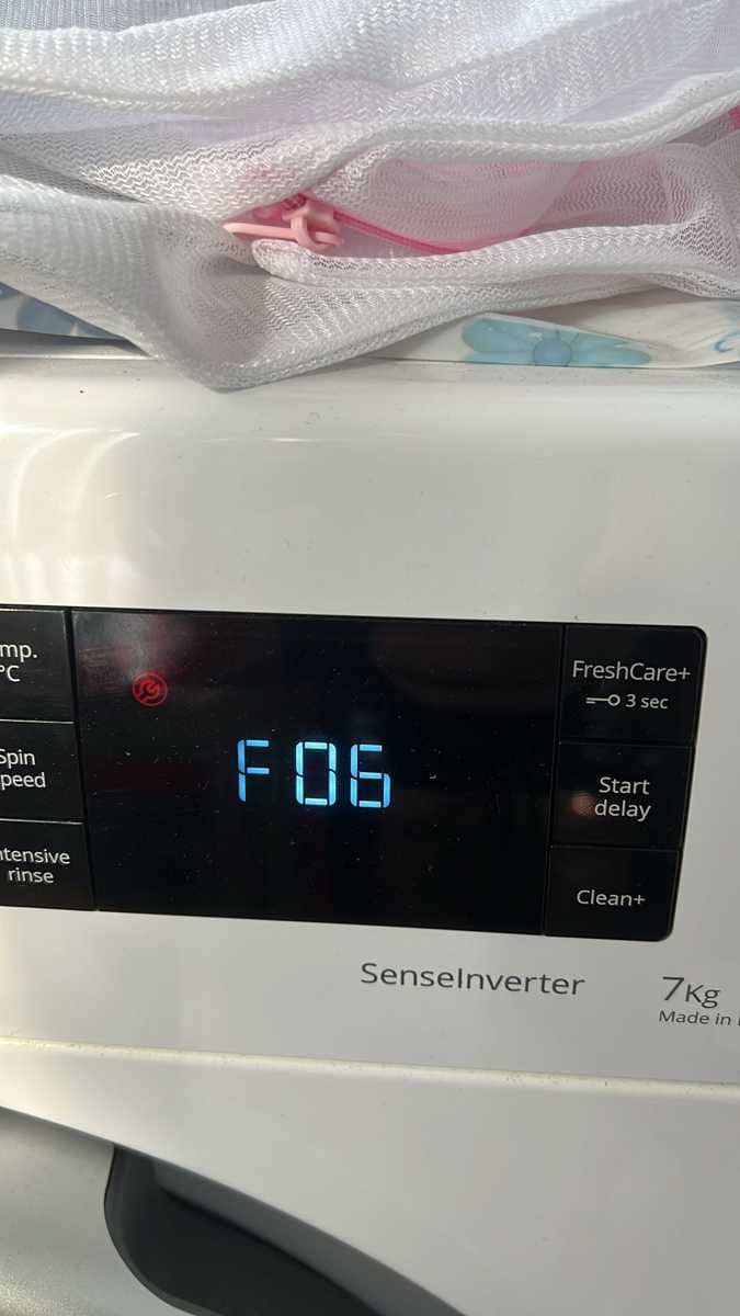 這部惠而浦FFCR系列洗衣機為何出現F06？現場檢查發現門鎖受潮的細節 🧩